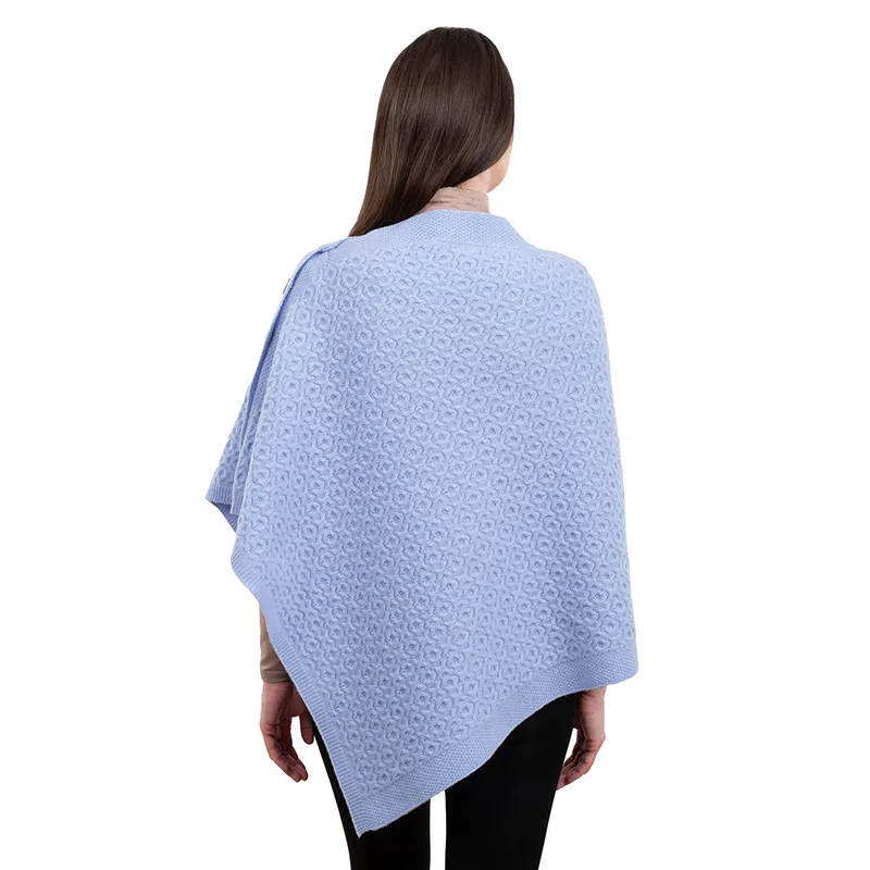 A10100 Lambswool Aran Pattern Poncho with Side Buttons Style Back Side View in LIGHT BLUE Colour Gaelsong 