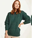 A20290GREENL Merino Crew Neck Aran Sweater Front Lifestyle  Gaelsong 