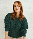A20290GREENL Merino Crew Neck Aran Sweater Front Lifestyle  Gaelsong 