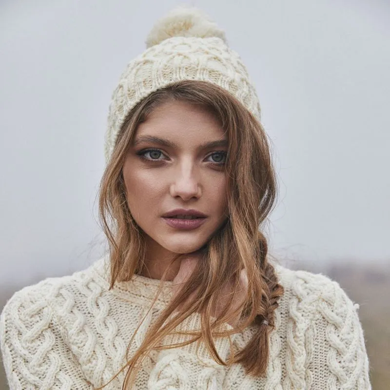 B30187 WHITE Colour Bobble Aran Cable Knit Hat Lifestyle Front View Gaelsong