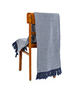Oxford Blue Herringbone Throw of Merino Wool on Chair 2 Gaelsong