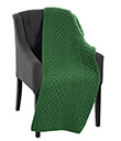 Honeycomb Merino Wool Aran Throw Green on Chair 1 Gaelsong