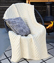 Honeycomb Merino Wool Aran Throw White on Chair Gaelsong
