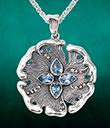 Water Pendant Mare of Sterling Silver and Sparkling Blue Topaz Lifestyle Gaelsong