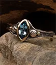 J40909 Topaz Celtic Rocks and Rivers Ring Blue Stone Gold Gaelsong