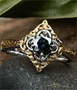 J40911 Rhodium Celtic Ring Sterling Silver Mystic Blue Moissanite Gaelsong