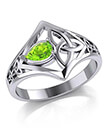 Peridot and Knot Ring on White Background 1 Gaelsong
