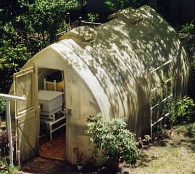 Greenhouse with fiberglass covering.