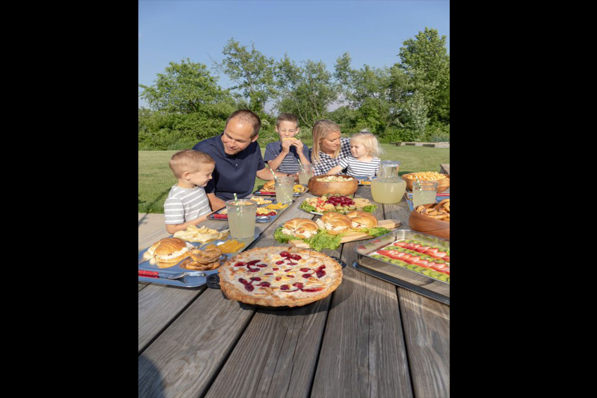 Family eating at a picnic table