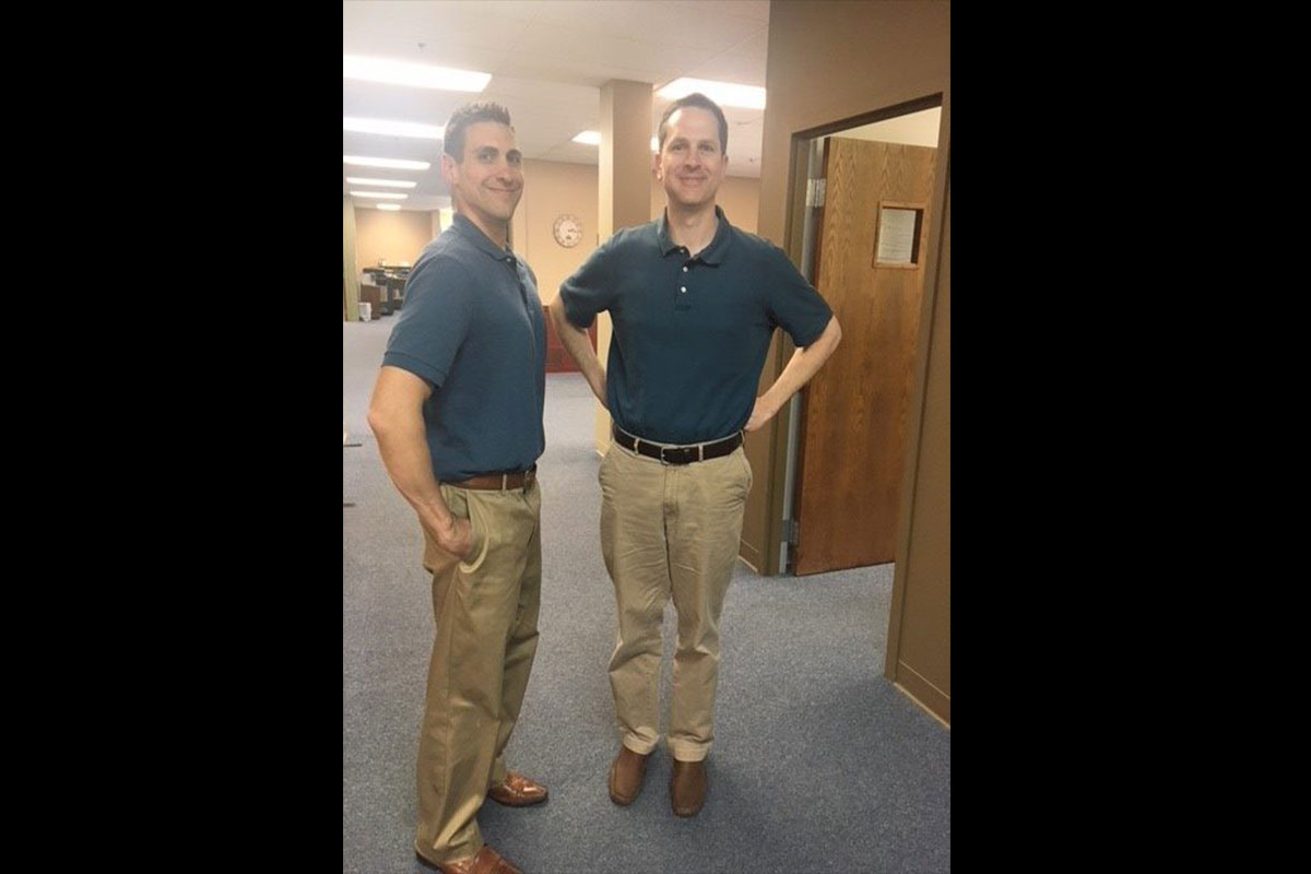 Twins?  Or just office mates that occasionally dress alike.