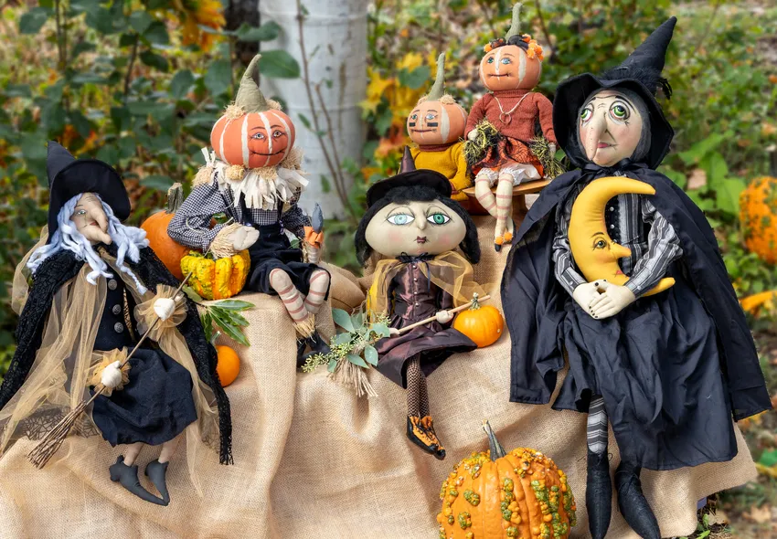 Halloween witch and pumpkin figurines