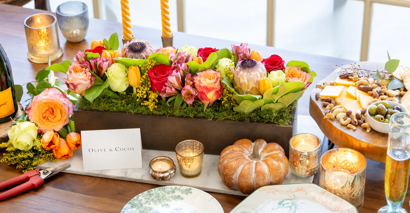 Thanksgiving table with a seasonal floral centerpiece