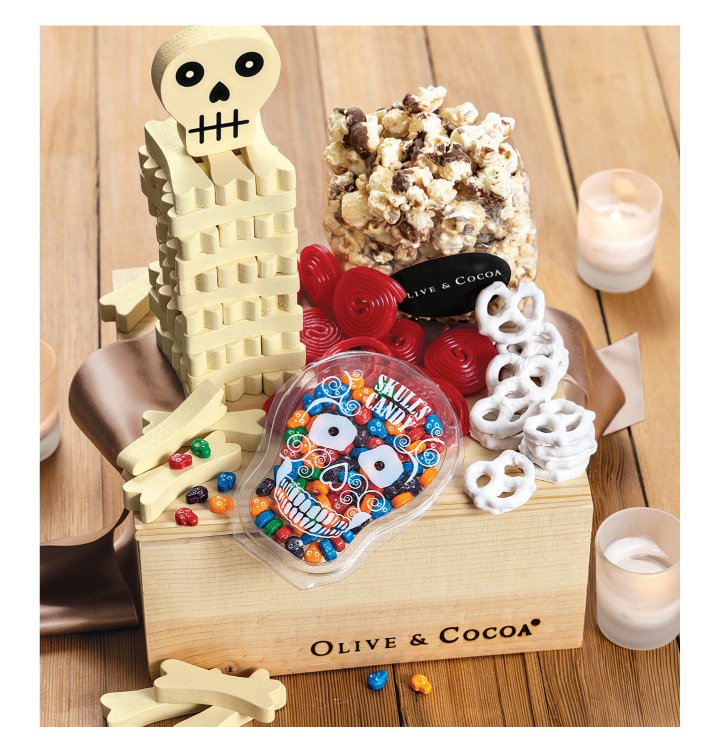 An image of Olive & Cocoas Halloween gift box with assorted halloween treats and 