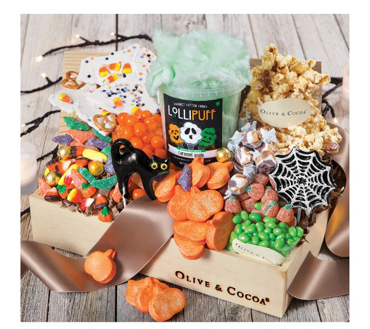 10 | HALLOWEEN TREATS CRATE An image of Olive & Cocoas ultimate halloween candy basket featuring tons of delectable halloween treats and sweets.