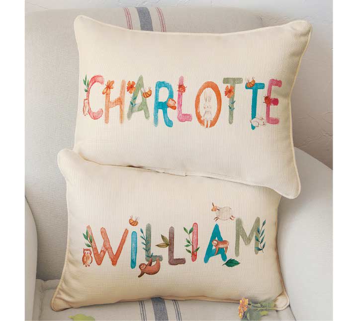 The Personalized Name Pillow from Olive & Cocoa makes a great gift for Christmas 2022