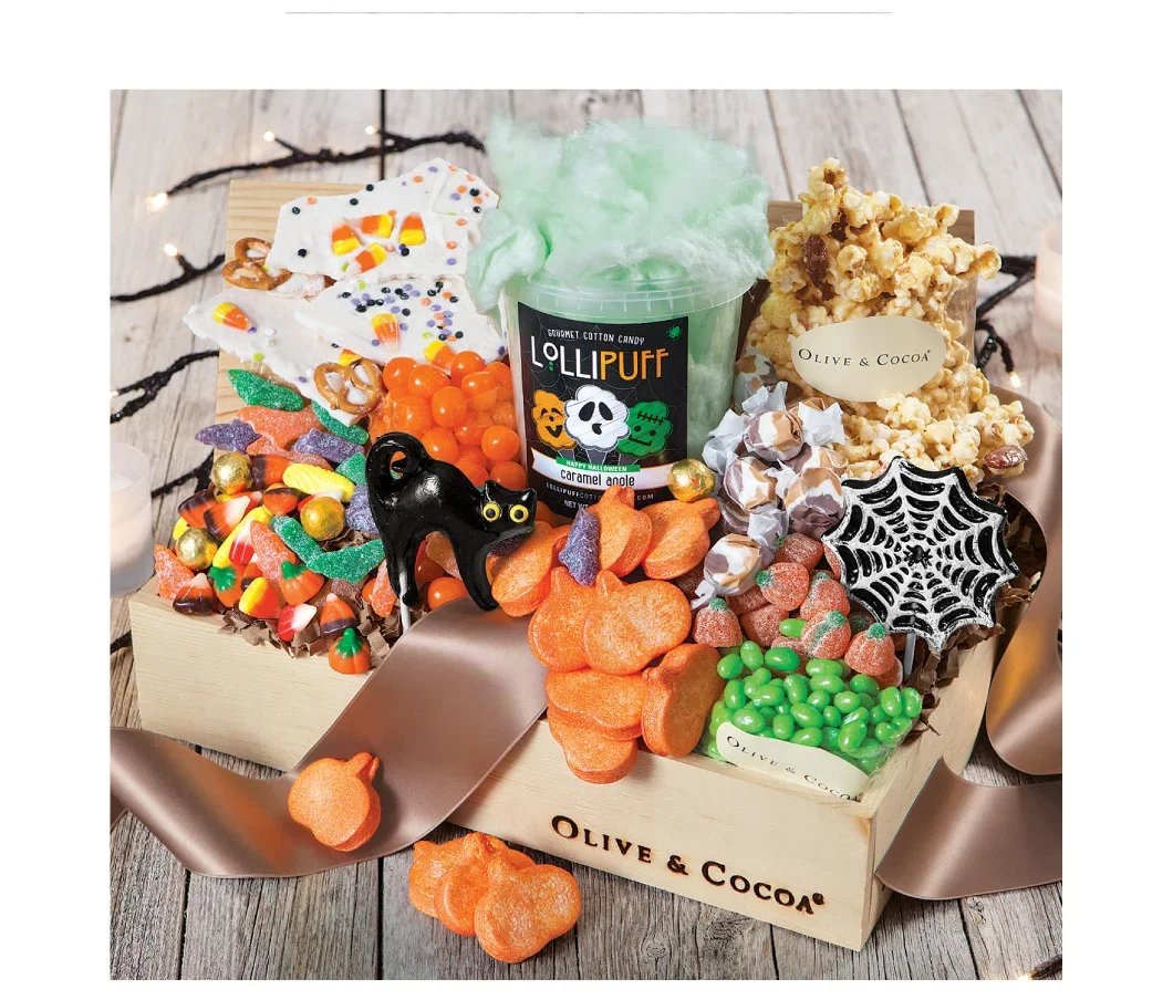 An image of Olive & Cocoas ultimate halloween candy basket featuring tons of delectable halloween treats and sweets.