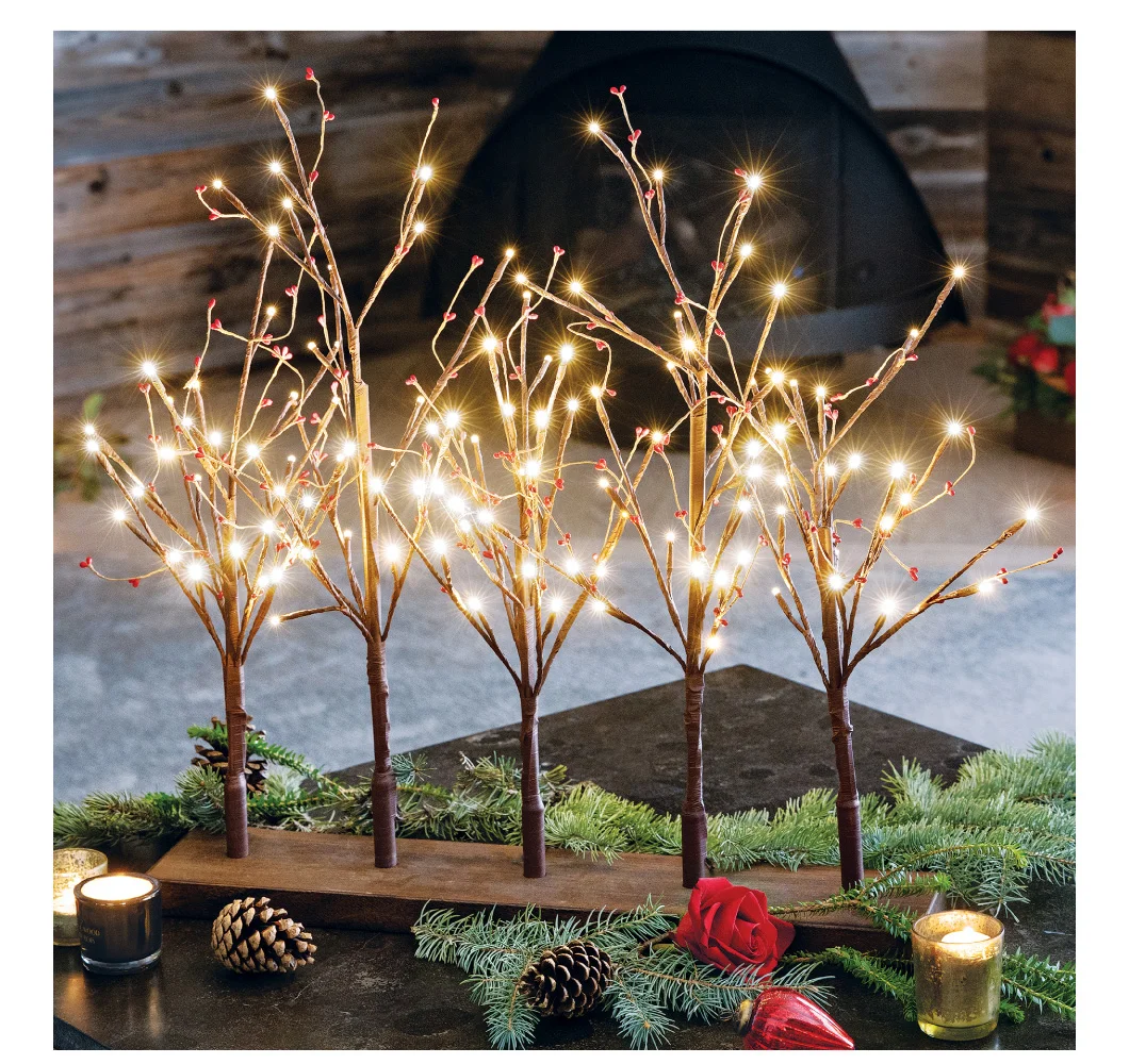 There's no better time than the holidays to celebrate the entire family with our Holly Berry Lit Trees.