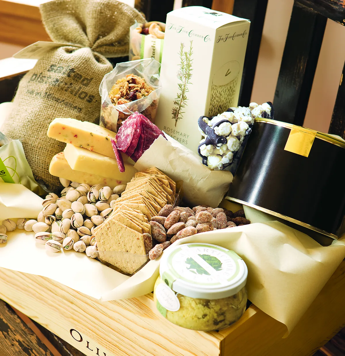 Farmhouse Gourmet Pantry crate with cheese, crackers, trail mix, and rocky road popcorn