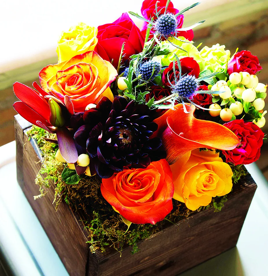 Farmhouse Fleur arrangement of roses, calla lilies, and thistle in a wood box