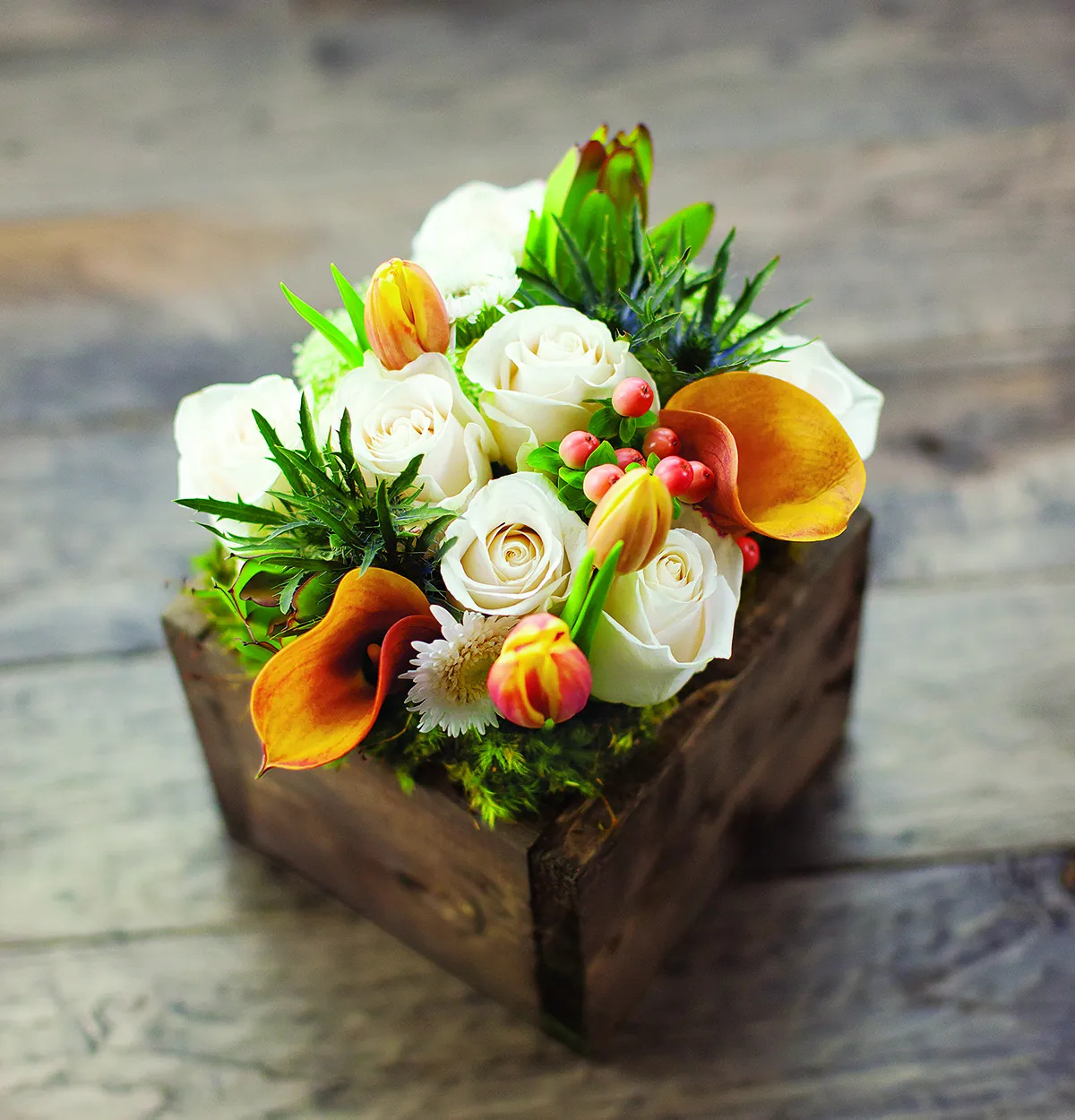 Fiore Bianco: white roses, orange calla lilies, and tulips arranged in a dark wood box