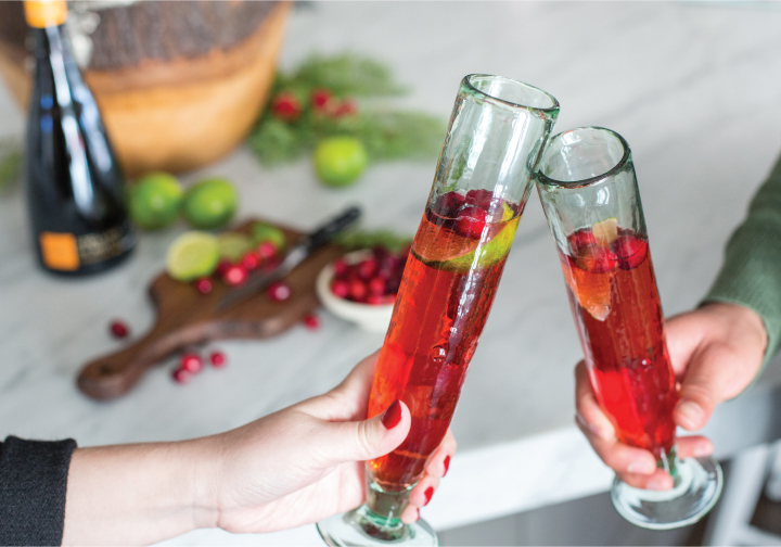 https://cdn.commercev3.net/cdn.oliveandcocoa.com/images/stories/CranberryChampagneCocktail_Recipe_Story_2017_07.jpg