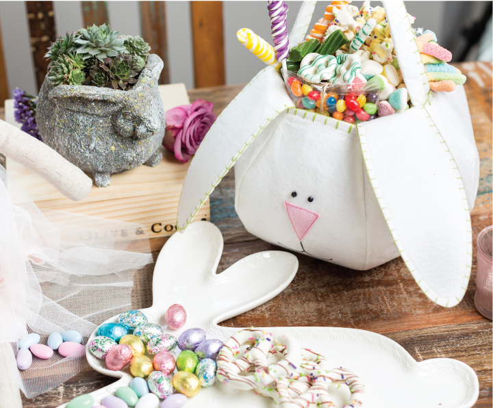 Image of Easter bunny decor holding candy