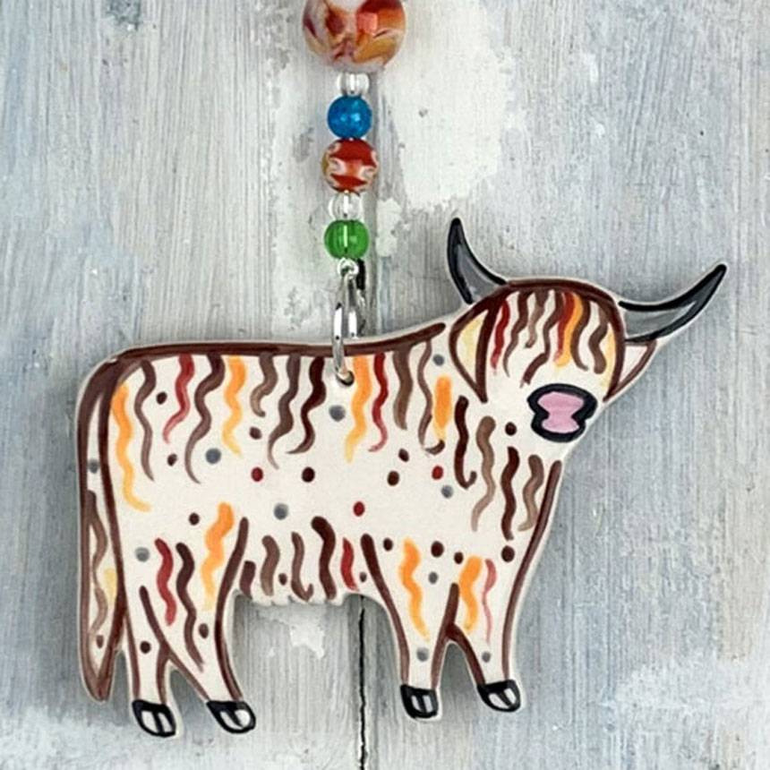 Multicolored Ceramic Highland Cow with beaded hanger