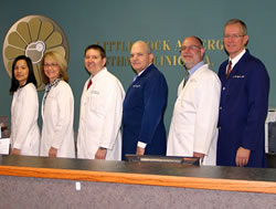 Group photo of Dr. Gene France, Dr. Jim Ingram, Dr. Deanna Ruddell, Dr. Karl Sitz, Dr. Blake Scheer, Dr. Ellen Lu, Dr. Kelsy Caplinger III